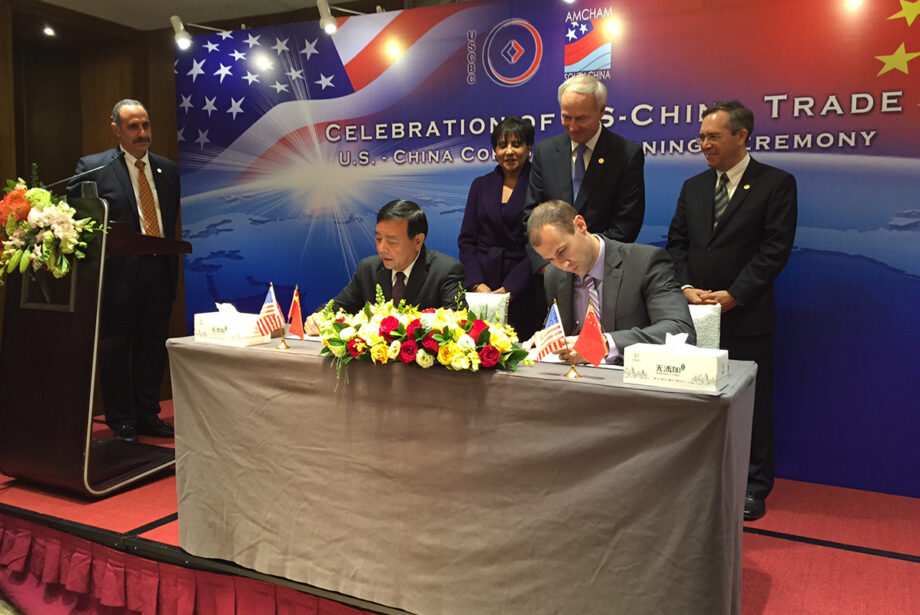 Gov. Asa Hutchinson and AEDC Executive Director Mike Preston meet with officials from Sun Paper in China.