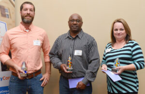 Scott Ussery, James Buggs and Kendra Caines of Conway Corp.