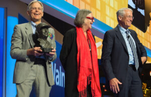 Jim Walton, from left, Alice Walton and Rob Walton at the annual Wal-Mart shareholders meeting on June 3.
