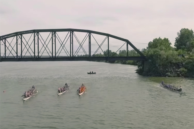 A screen capture from Ascending Impressions' YouTube channel documenting the Fort Smith Dragon Boat Festival as seen from a remote controlled drone.