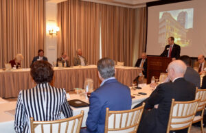 Members of the Governor's Blue Ribbon Commission to Report on the Economic Competitiveness of Computing and Data Analytics in Arkansas listen to Co-Chair Mike Preston, executive director of the Arkansas Economic Development Commission, at the group's first meeting on Friday.