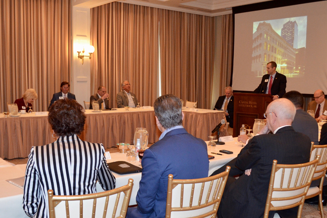 Members of the Governor's Blue Ribbon Commission to Report on the Economic Competitiveness of Computing and Data Analytics in Arkansas listen to Co-Chair Mike Preston, executive director of the Arkansas Economic Development Commission, at the group's first meeting on Friday.