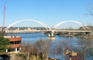 The Broadway Bridge between Little Rock and North Little Rock carries morning commuters across the Arkansas River for the first time since last August.