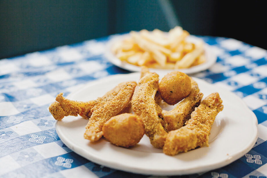 Fried buffalo ribs with hushpuppies and fries at Lassis Inn.