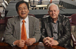 Richard Wang, executive director of the Institute for Chief Data Officers at the University of Arkansas at Little Rock, and John Talburt, campus director of the institute in the space at UA-Little Rock where students conduct research and professionals receive training.