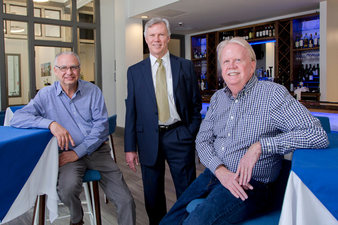 Anthony Taylor, left, Robert Zunick and&nbsp;Bob Kempkes of Taylor/Kempkes Architects in The Avenue, a new hotel and restaurant on Central Avenue in Hot Springs.