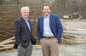 Tommy Hodges (L) and Isaac Smith represent two generations of development at Little Rock’s Gateway Town Center with its growing entertainment draws.