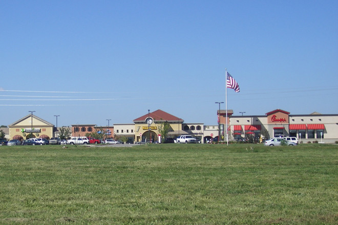 The Tuscany Square Shopping Center on Pleasant Grove Road in Rogers