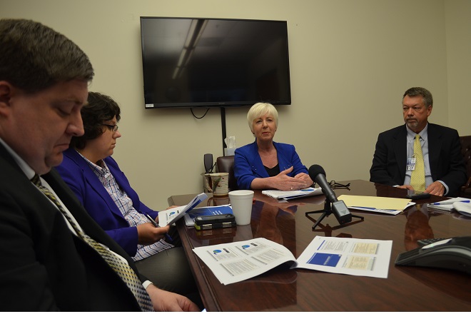 Arkansas DHS Director Cindy Gillespie and other DHS officials speak with reporters Wednesday about "Arkansas Works 2.0."