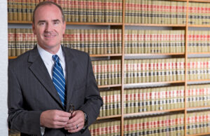 Mark M. Henry said Wal-Mart executive Tal Herman initially tried to hire Cuker for the Walmart2Go project and then changed his mind.