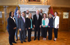 Members of the 2017 Under 40 Forum presented their findings to Gov. Asa Hutchinson.