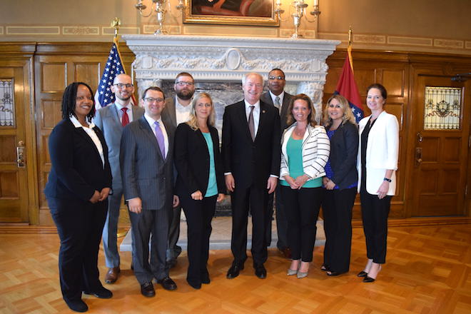 Members of the 2017 Under 40 Forum presented their findings to Gov. Asa Hutchinson.