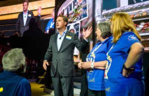 Wal-Mart CEO Doug McMillon speaks with Asda employees during the retailer's shareholders' meeting in Fayetteville.