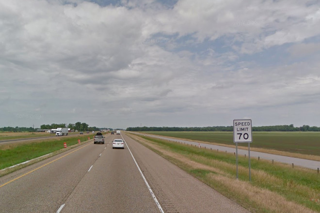 Westbound traffic passes a speed limit sign on Interstate 40 outside West Memphis.