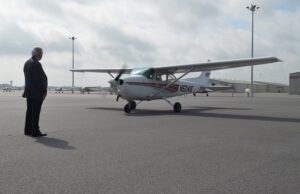 Central Flying Service CEO&nbsp;Dick Holbert watches&nbsp;Chief Flight Instructor Mike Jones and student Kristine Beard finish a historic 475,000 hours of training on Wednesday.&nbsp;