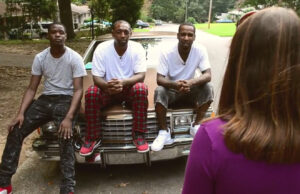 KARK Reporter Marci Manley speaks with Brian Silva (third from left) and others in a report for HuffPost's "Listen to America" series.