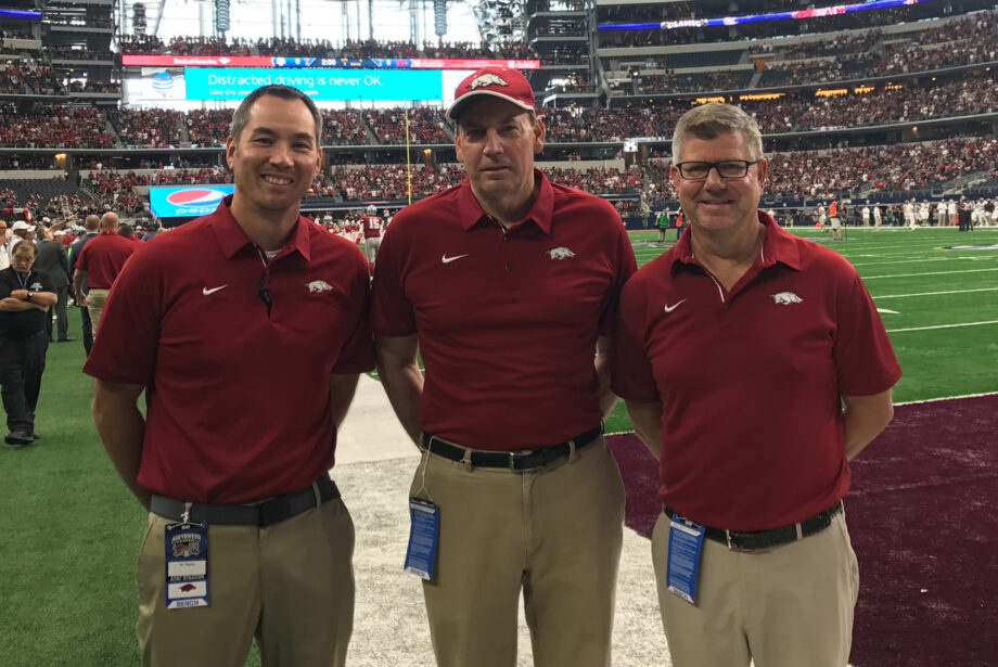 Dr. Ramon Ylanan, Dr. Terry Sites, Dr. Christopher Arnold, all of Advanced Orthopaedic Specialists, roam the sidelines at Razorback games, such as the Southwest Classic in Dallas shown above.