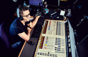 Although they’re a bit worn and taped up, a nostalgic Bobby Bones still wears the headphones he got at his first-ever radio job in Hot Springs.