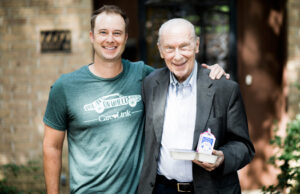 A CareLink Meals on Wheels recipient greets the volunteer who delivers fresh meals to his doorstep each day.