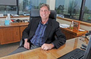 Dan Cushman, president and CEO of PAM Transport Inc., sits in his office in Tontitown.