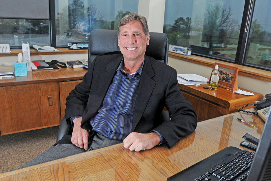 Dan Cushman, president and CEO of PAM Transport Inc., sits in his office in Tontitown.