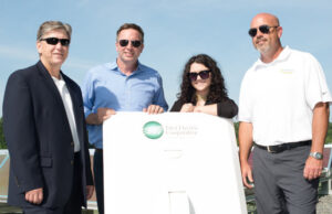 Today’s Power President Michael Henderson, from left, with Chris Burnley, who has left the company, Jennah Denney and Matt Irving, at an earlier solar groundbreaking.