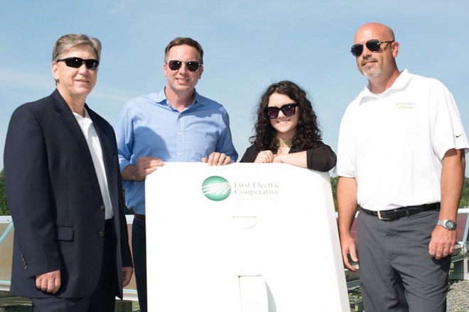 Today’s Power President Michael Henderson, from left, with Chris Burnley, who has left the company, Jennah Denney and Matt Irving, at an earlier solar groundbreaking.