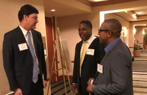 Ted Thomas with Scott Hamilton, regional director of MISO South, right, and Chris Jones of BCT Partners.