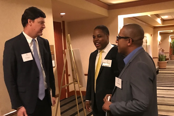 Ted Thomas with Scott Hamilton, regional director of MISO South, right, and Chris Jones of BCT Partners.