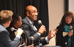 Ben Hasan, gesturing, and Mary Oleksiuk, right, addressed diversity at  a recent Northwest Arkansas Council meeting. Hasan is Walmart’s chief diversity and inclusion officer. Oleksiuk leads human resources at Tyson.