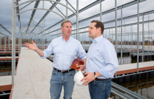 John Burkhalter, left, Rock City Yacht Club developer, and Chris Masingill, strategic consultant for Burkhalter Technologies.