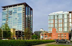 Downtown Little Rock’s iconic condominium towers rise just a block apart on corners of Third Street. 300 Third Tower is at left, with 100 units, and the 132-unit River Market Tower is at right, overlooking Rock Street Lofts. Between them in the far background is the Capital Commerce Center, which has 18 condo units.
