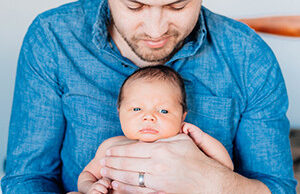 Justin Eddy and his son, Parker Eddy. Justin is a senior creative at Saatchi & Saatchi X in Springdale, which offers new parents four weeks of paid leave.