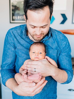 Justin Eddy and his son, Parker Eddy. Justin is a senior creative at Saatchi & Saatchi X in Springdale, which offers new parents four weeks of paid leave.