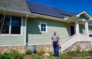 Builder Keith Wingfield at a net-zero, high-efficiency home powered by solar panels that he built at 2501 N. Pierce St. in Little Rock.