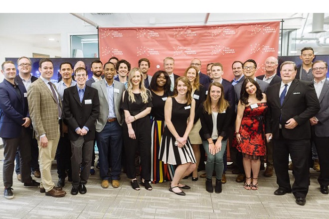 Executives of startups selected for FIS' and the Venture Center's 2018 Fintech Accelerator pose for a group photo with community leaders, Venture Center staff and others at the kickoff event for the program.&nbsp;