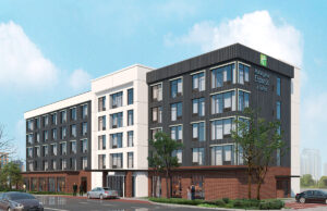 A Holiday Inn Express & Suites on East Fourth Street, seen here in a rendering, is expected to open before Christmas 2019.