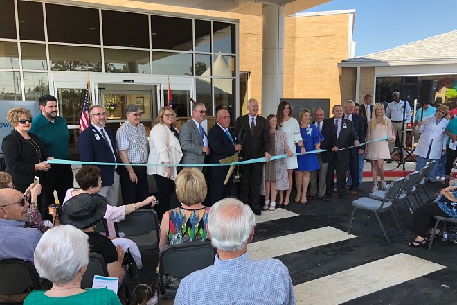 Drew Memorial Health System officials and community leaders cut the ribbon at an unveiling of the newly-expanded hospital.