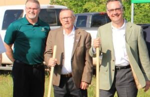 Arkansas Tech University-Ozark Chancellor Bruce Sikes, Mayor T.R. McNutt and Ecodrum CEO Tim Epp attended the groundbreaking for the company's new plant in Ozark on Tuesday.