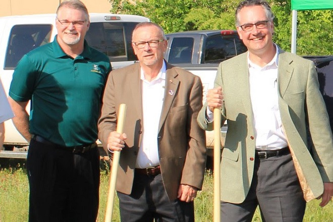 Arkansas Tech University-Ozark Chancellor Bruce Sikes, Mayor T.R. McNutt and Ecodrum CEO Tim Epp attended the groundbreaking for the company's new plant in Ozark on Tuesday.