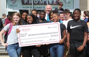 Gov. Asa Hutchinson with students at Jacksonville High School, which received a $377,812 Military Affairs grant to develop a cyber security curriculum with the Little Rock Air Force Base Community Council.