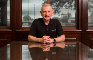 Kim Eskew, CEO of Harps Food Stores Inc., says that competition from Amazon is a growing concern, but more immediate competition comes from Walmart and a wave of new Dollar General stores.