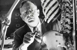 Dr. Alan R. Moritz with skeleton at Harvard Medical School's Department of Legal Medicine, circa 1946.