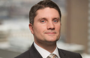 Larry Watkins of Mitchell Williams Selig Gates & Woodyard PLLC