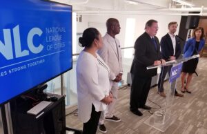 Little Rock Mayor Mark Stodola, president of the National League of Cities, speaks during the NLC's release of a report on automation and what cities can do to prepare for how it will affect the workforce. He is flanked by, from left,&nbsp;Irma Esparza Diggs, senior executive and director of federal advocacy for the NLC; NLC CEO and Executive Director&nbsp;Clarence Anthony; Brooks Rainwater, senior executive and director of NLC's Center for City Solutions; and FCC Commissioner Jessica Rosenworcel.