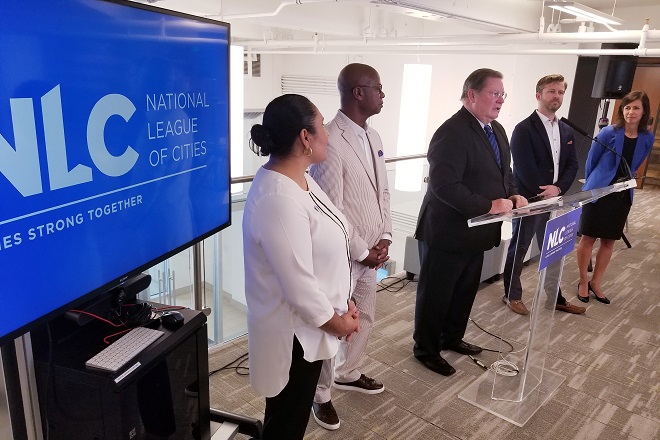 Little Rock Mayor Mark Stodola, president of the National League of Cities, speaks during the NLC's release of a report on automation and what cities can do to prepare for how it will affect the workforce. He is flanked by, from left,&nbsp;Irma Esparza Diggs, senior executive and director of federal advocacy for the NLC; NLC CEO and Executive Director&nbsp;Clarence Anthony; Brooks Rainwater, senior executive and director of NLC's Center for City Solutions; and FCC Commissioner Jessica Rosenworcel.