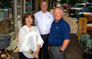 Kelly Hale Syer, executive director of Downtown Springdale, is optimistic about revitalization, along with Springdale Mayor Doug Sprouse, center, and Bill Rogers, an official with the Springdale Chamber of Commerce. They are seen here on Emma Street, the backbone of the city&rsquo;s Downtown Master Plan.