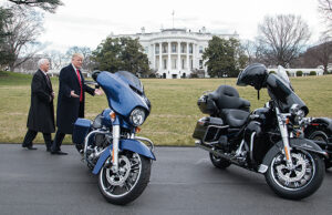 President Donald Trump and Vice President Mike Pence admire several Harley-Davidson bikes on the South Lawn driveway of the White House in Washington, D.C. during the adminstration's first month in office.