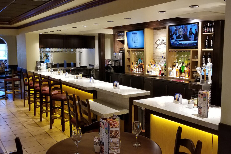 The bar at the North Little Rock Olive Garden at  2943 Lakewood Village Drive. Remodeling efforts included recharging stations for mobile devices at the Olive Garden bars.