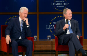 Former presidents Bill Clinton and George W. Bush appear at the 2017&nbsp;Presidential Leadership Scholars graduation ceremony at the George W. Bush Presidential Center in Dallas.